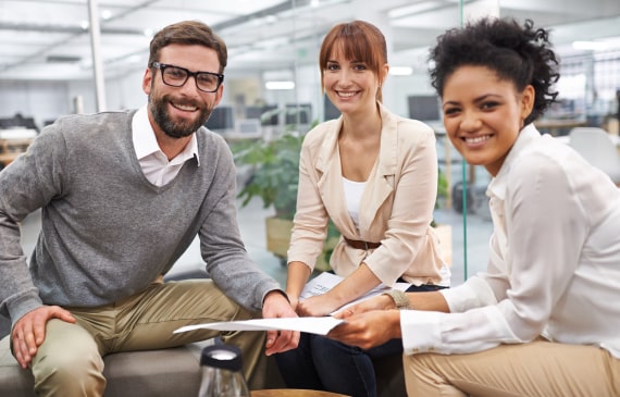Professionals collaborating in a bright office